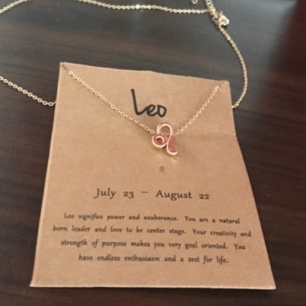 NWT Leo  necklace, gold colored